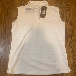 Look cute on the golf course with the NWT Lady Hagen hydro dry sleeveless top.
